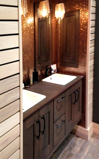 copper detail wall with walnut double vanity