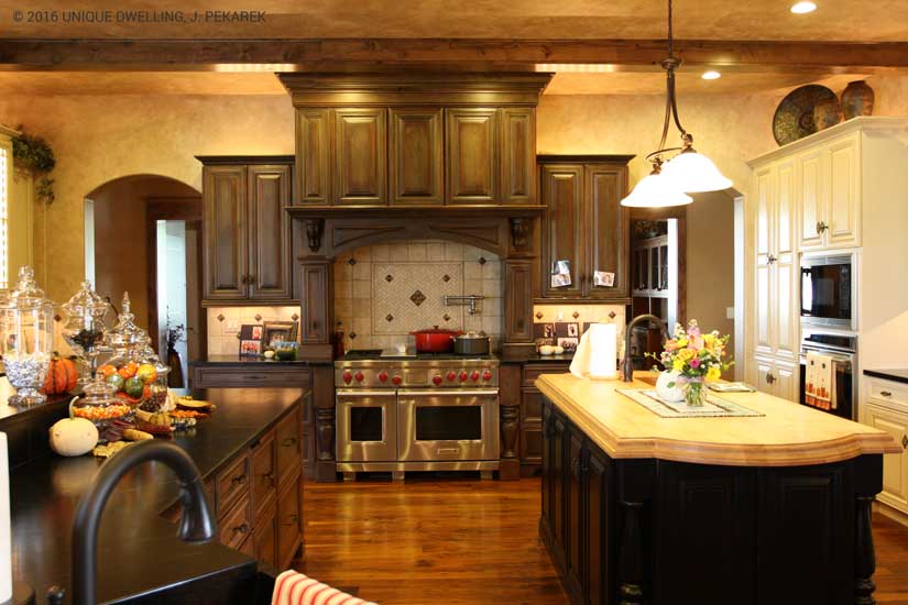 large Kitchen with under cabinet light, pendents, up light and recessed lights