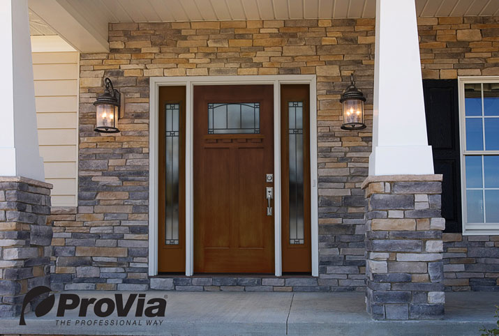 fiberglass front door with stone and siding