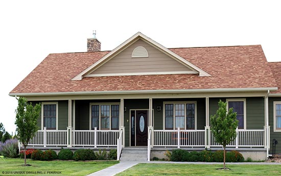 two tone windows with green siding