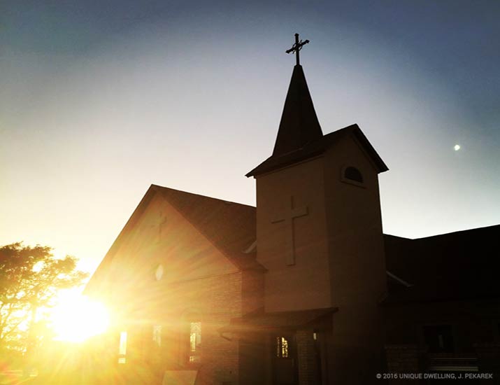 church with sunlight in background