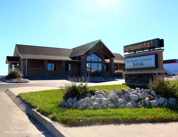 bank with stone wood beams and drive up