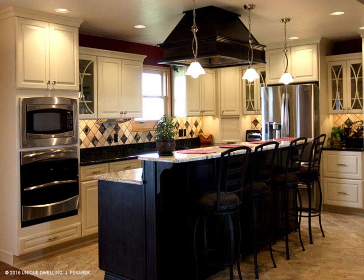 white country kitchen with black island