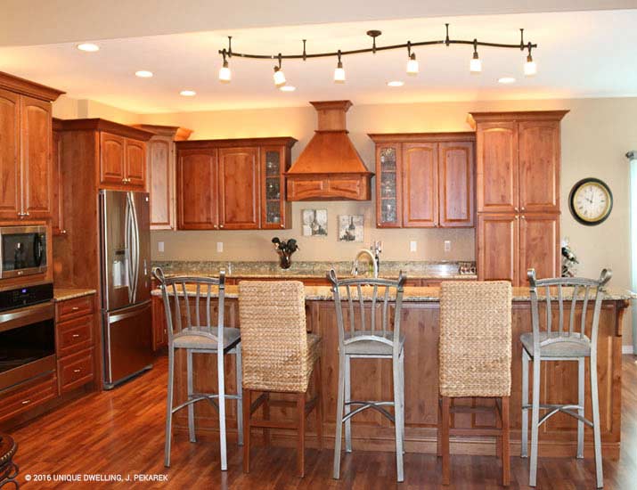 cherry cabinet kitchen with hardwood floor