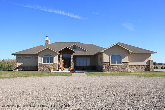 ranch house with stucco and stone