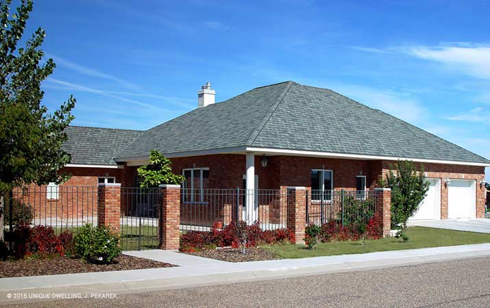 European county influenced brick new construction home