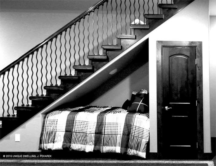 under staircase reading nook