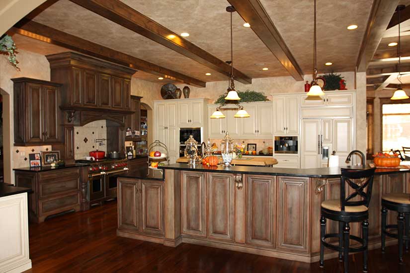 white range hood with cherry cabinets