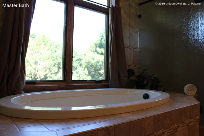 knotty pine millwork with walk-in shower