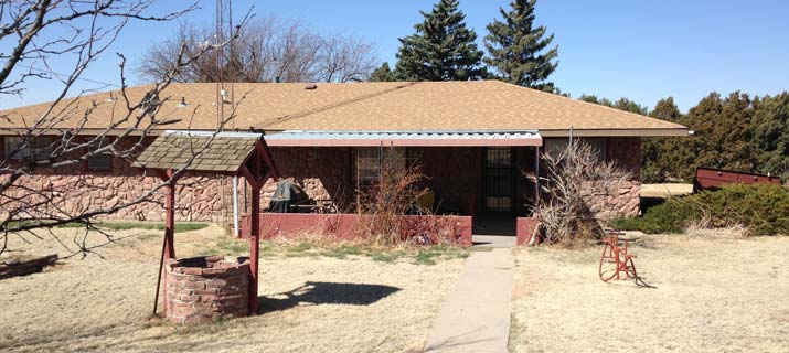 front elevation with stone and stucco