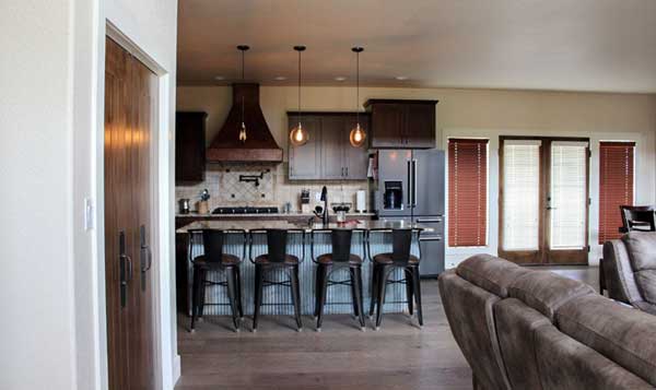 kitchen with seating and dark cabinets