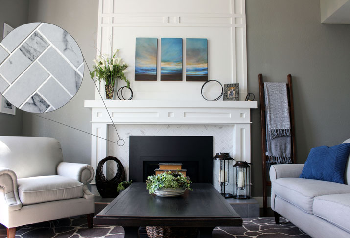 white wainscoting fireplace with marble herringbone surround